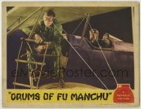8k533 DRUMS OF FU MANCHU LC 1943 great image of aviator lowering ladder from his airplane!