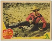 8k648 HEART OF THE RIO GRANDE LC 1942 full-length close up of cowboy Gene Autry on ground w/gun!