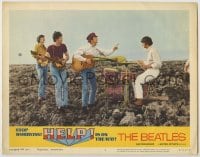 8k654 HELP LC #6 1965 The Beatles, John, Paul, George & Ringo performing on a rocky beach!