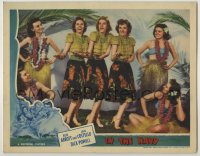 8k692 IN THE NAVY LC 1941 close up of the Andrews Sisters in floral skirts hula dancing in Hawaii!