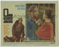 8k812 ONE EYED JACKS LC #3 1961 pretty Pina Pellicer grabs Marlon Brando through prison bars!