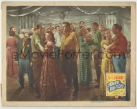 8k839 PRAIRIE RUSTLERS LC 1945 Buster Crabbe & Fuzzy St. John standing between dancing couples!