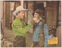 8k846 RAINBOW OVER TEXAS LC 1946 great close up of Roy Rogers pulling Gabby Hayes' beard!