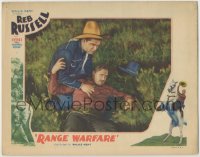 8k849 RANGE WARFARE LC 1934 cowboy Reb Russell helps his friend Wally Wales, who has fallen!
