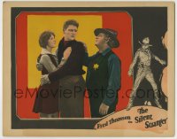 8k893 SILENT STRANGER LC 1924 sheriff puts his hand on Fred Thomson, who's hugging his sweetheart!
