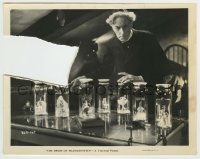 8s143 BRIDE OF FRANKENSTEIN 8x10.25 still 1935 Ernest Thesiger with his jars of little people!