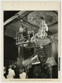8s167 CARPETBAGGERS candid 8x11 key book still 1964 crew films sexy Carroll Baker on chandelier!