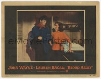 8z143 BLOOD ALLEY LC #5 1955 John Wayne stares at sexy Lauren Bacall in bedroom, William Wellman