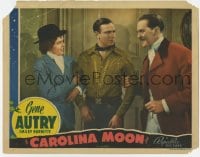 8z188 CAROLINA MOON LC 1940 man & woman pull at cowboy Gene Autry's arms from each side!