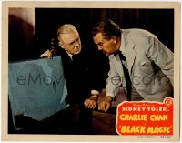 8z199 CHARLIE CHAN IN BLACK MAGIC LC 1944 Sidney Toler inspects blood stain & bullet hole on chair!