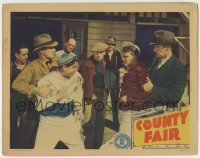 8z238 COUNTY FAIR LC 1937 two men stop John Arledge from fighting with another horse jockey!