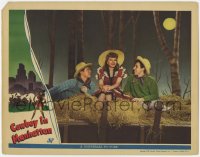 8z242 COWBOY IN MANHATTAN LC 1943 cowgirl Frances Langford sitting in haystack by Robert Paige!