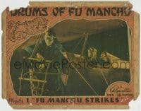 8z300 DRUMS OF FU MANCHU chapter 1 LC 1940 great c/u of guy dropping ladder from airplane!