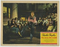8z383 GREAT DICTATOR LC 1940 Paulette Goddard & crowd watch Charlie Chaplin do goose step dance!