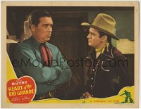 8z412 HEART OF THE RIO GRANDE LC 1942 Gene Autry stares at big William Haade with arms crossed!