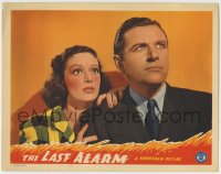 8z514 LAST ALARM LC 1940 close up of scared Polly Ann Young & Warren Hull, cool fiery border art!