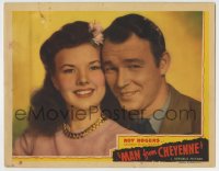 8z569 MAN FROM CHEYENNE LC 1942 great close portrait of Roy Rogers with 4th-billed Gale Storm!