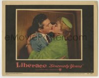 8z824 SINCERELY YOURS LC #7 1955 close up of legendary pianist Liberace kissing Dorothy Malone!