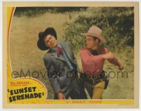 8z878 SUNSET SERENADE LC 1942 image of cowboy Roy Rogers slugging Onslow Stevens in the face!
