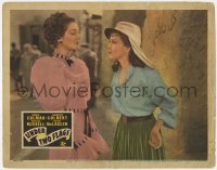 8z929 UNDER TWO FLAGS LC R1943 Claudette Colbert in legionnaire hat glares at Rosalind Russell!