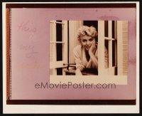 9f088 MARILYN MONROE color 12x14.75 REPRO photo 1980s she's looking pensive leaning out window!