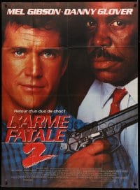 9f825 LETHAL WEAPON 2 French 1p 1989 great close up of police partners Mel Gibson & Danny Glover!