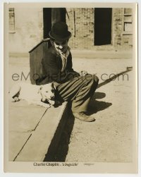 9s274 DOG'S LIFE 8x10.25 still R1920s Charlie Chaplin as Tramp sitting with dog on street corner!