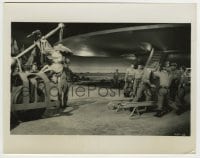 9s329 FORBIDDEN PLANET 8x10.25 still 1956 Earl Holliman held upside-down by giant magnet!