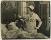 9s688 OH DOCTOR 8x10.25 still 1925 Reginald Denny smiles as nurse Mary Astor takes his temperature!