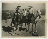 9s767 RANGE FEUD 8x10.25 still 1931 John Wayne & Buck Jones lifting Susan Fleming between horses!