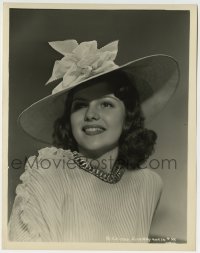 9s796 RITA HAYWORTH 8x10.25 still 1940s head & shoulders smiling portrait in ruffled dress & hat!