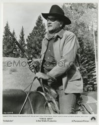 9s939 TRUE GRIT 7.75x9.75 still 1969 c/u of John Wayne as Rooster Cogburn with rifle on horse!
