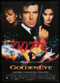 9w568 GOLDENEYE German 1995 cast image of Pierce Brosnan as Bond, Isabella Scorupco, Famke Janssen