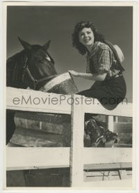 9x014 ANN RUTHERFORD deluxe 9.25x13 still 1940s sitting on fence & feeding horse in cowgirl outfit!