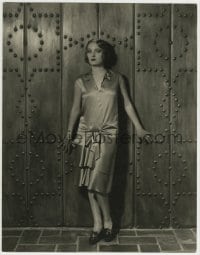 9x167 PAULINE STARKE deluxe 10.5x13.5 still 1929 standing by wonderful riveted door by Russell Ball!