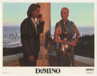 9z228 DOMINO LC 1989 sexy Brigitte Nielsen in shimmering gown staring at man on phone!