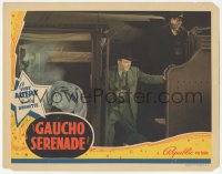 9z290 GAUCHO SERENADE LC 1940 close up of bad guys with guns drawn on train by dead conductor!