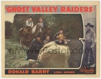 9z304 GHOST VALLEY RAIDERS LC 1940 close up of cowboys with rifles drawn hiding behind boulder!