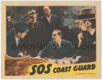 9z795 SOS COAST GUARD LC 1942 mad scientist Bela Lugosi surrounded by guys in cave hideout!