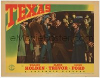 9z852 TEXAS LC 1941 young William Holden gets pushed by angry guy in crowd!