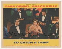 9z877 TO CATCH A THIEF LC #8 1955 Cary Grant behind woman at casino baccarat table, Alfred Hitchcock