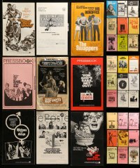 1a358 LOT OF 36 CUT PRESSBOOKS 1970s advertising for a variety of different movies!