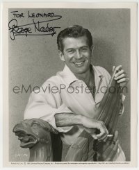 1b428 GEORGE NADER signed 8x10 still 1955 great portrait smiling & smoking by cool griffon statue!