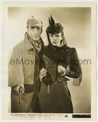 1h067 ADVENTURES OF SHERLOCK HOLMES 8x10.25 still 1939 Basil Rathbone with gun & Ida Lupino!