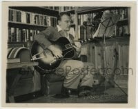 1h476 JAMES CAGNEY 7.25x9 news photo 1947 the scrappy little Irishman whanging away at his guitar!