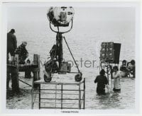 1h036 JAWS candid 8.25x10 still 1975 Steven Spielberg & crew with film equipment in the water!