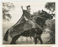 1h066 ADVENTURES OF ROBIN HOOD 8.25x10 still 1938 c/u of Errol Flynn with bow & arrow on horse!