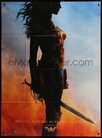 1p984 WONDER WOMAN teaser French 1p 2017 profile silhouette of sexy Gal Gadot in costume with sword!