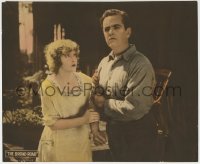 1r401 BROAD ROAD LC 1923 close up of pretty May Allison grabbing Richard Travers by the arm!