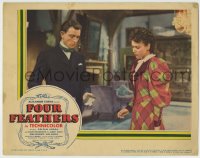 1r519 FOUR FEATHERS LC 1939 John Clements & June Duprez are puzzled by what is in his box!